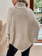 Freya | Women's Turtleneck Poncho Jumper | Cable Knit · Eltrendio